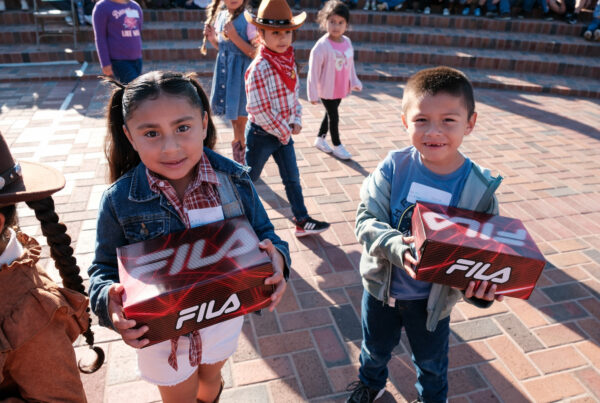 Kids at Moffett Elementary get new shoes thanks to travelers and Journey For Good Foundation