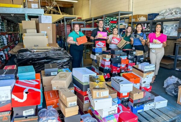 Volunteers from San Manuel drop off shoes