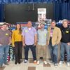 Dan Dressel and friends pose with new shoes for Felton Elementary kids